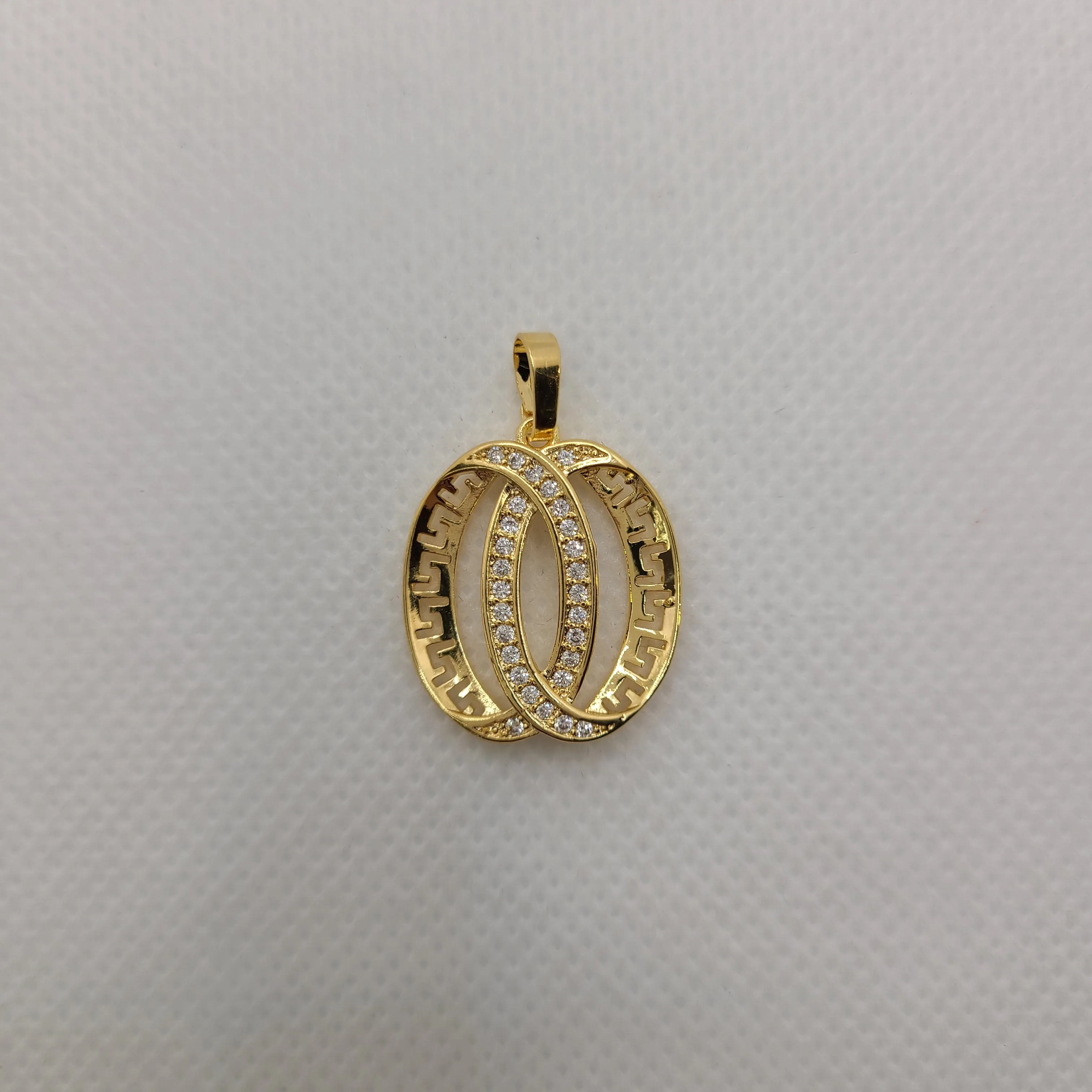 Gold pated versace design pendants